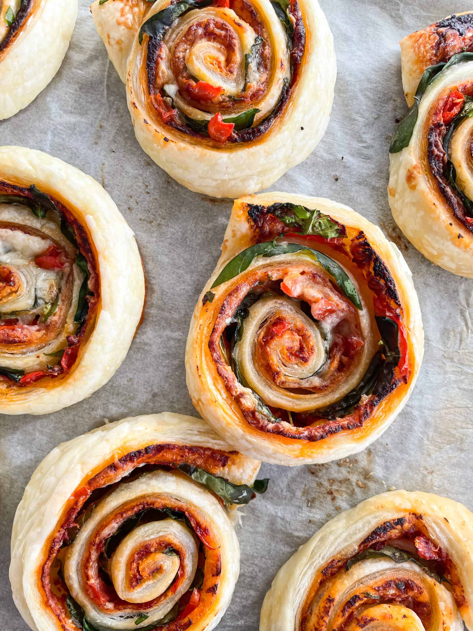 pinwheels with tomato, cheese and spinach